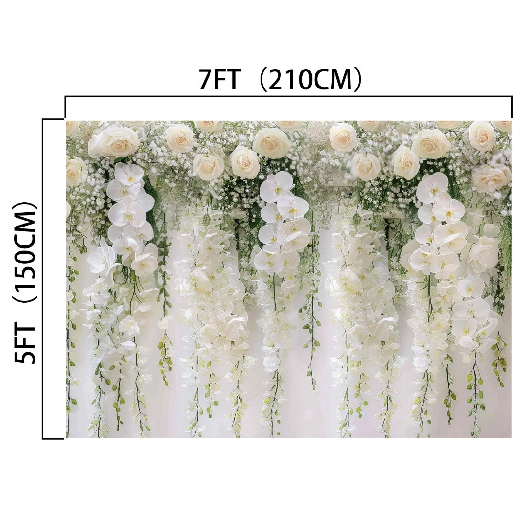 This stunning White Rose Floral Baby Girl Birthday Flower Backdrop - ideasbackdrop, measuring 7 feet wide and 5 feet tall, features cascading white and cream flowers with lush greenery. Perfect for bridal showers or fashion shoots, it adds a touch of elegance to any setting.