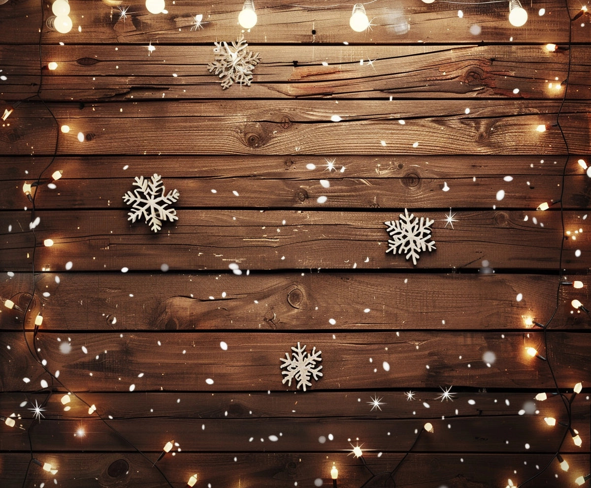 The ideasbackdrop Wood Photo Backdrop Snowflake Brown Wooden Wall Background Photography for Party Wedding Baby Photoshoot, string lights, artificial snowflakes, and scattered snow sets a perfect vintage scene.